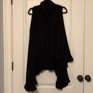 Long Black ruffle sweater vest from Anthropologie